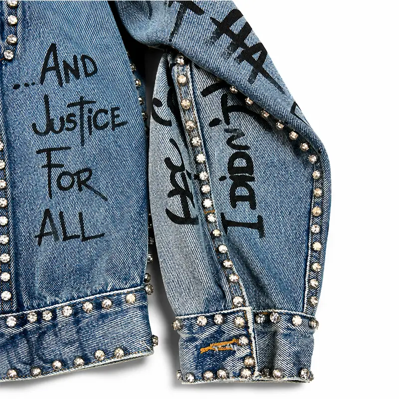 Studded denim jacket sleeve with custom graffiti print wholesale