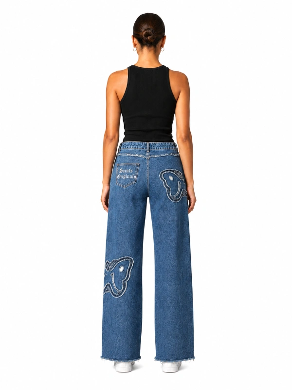 Back view of custom embroidered wide leg jeans with medium wash denim for private label brands