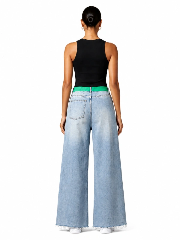 Back view of custom wide leg jeans with green waistband and light wash denim