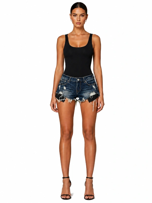 Custom distressed denim shorts with dark wash denim rivets and frayed hem