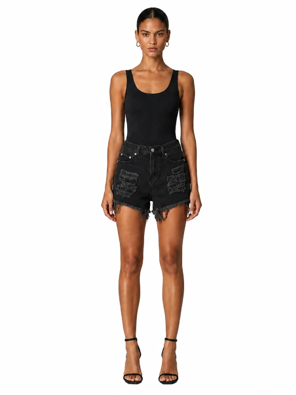 Custom black denim shorts with distressed embroidery texture and frayed hem