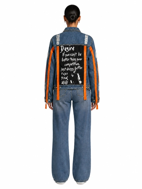 Back view of custom denim jacket with black graphic text patch and orange straps OEM