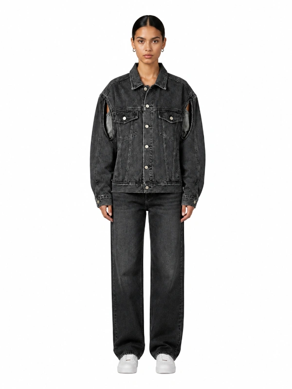 Front view of deconstructed cutout shoulder black denim jacket on model wholesale manufacturer