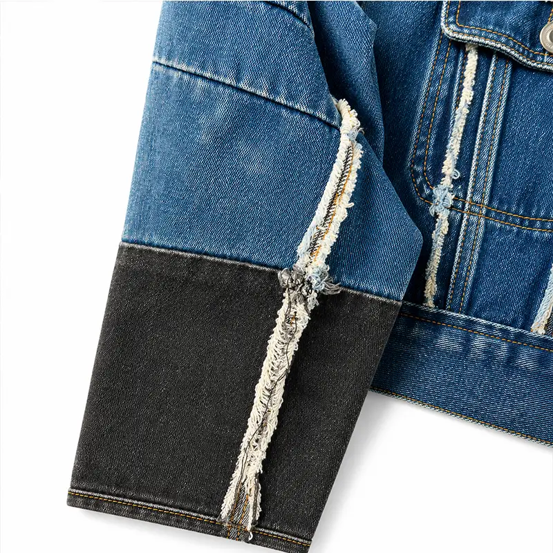 Color block sleeve with exposed frayed seam on custom cropped denim jacket OEM