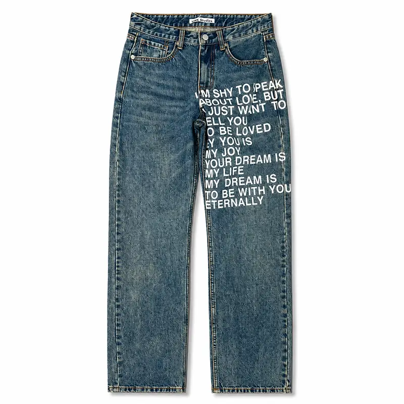 Full flat lay view of custom printed straight leg jeans with white text graphic print