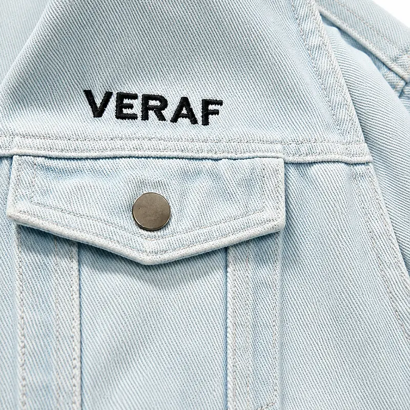 Private label custom logo embroidery on light blue denim jacket pocket