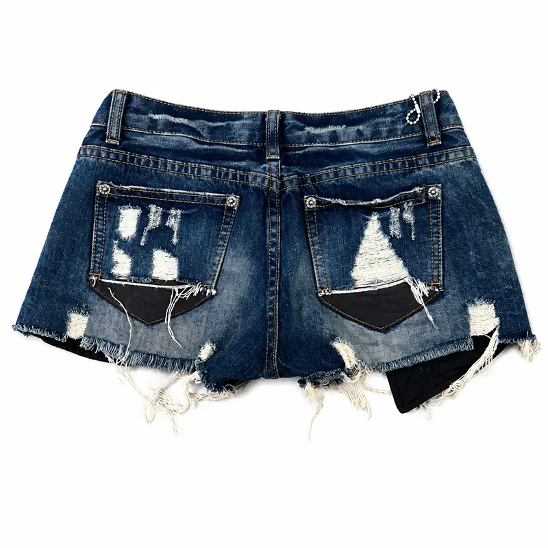 Back view of custom distressed denim shorts with dark wash denim and frayed hem