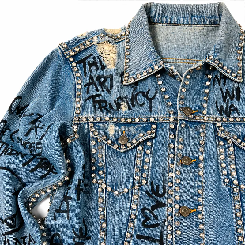 Hand-applied studs on denim jacket front pocket OEM manufacturing