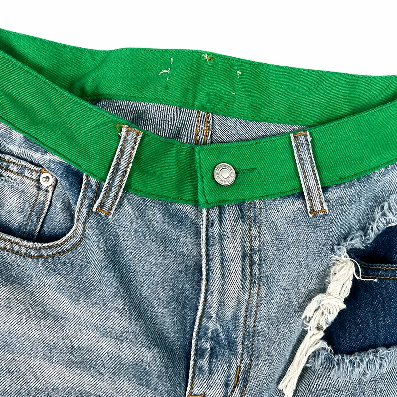 Private label wide leg denim jeans with green waistband
