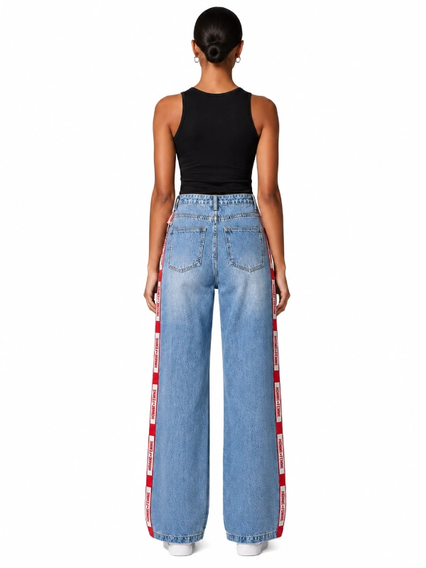 Back view of custom side tape wide leg jeans with light wash denim