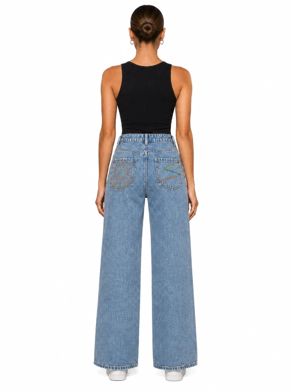 Light wash custom wide leg denim jeans with smile button details