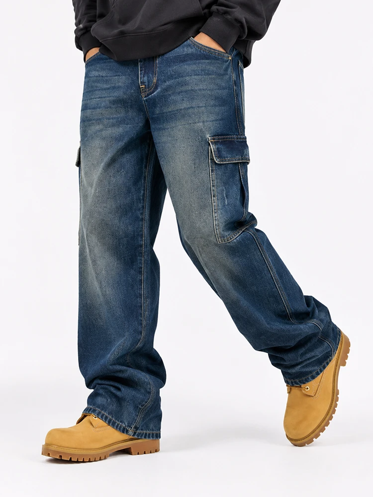 Model wearing blue cargo denim jeans with side pockets
