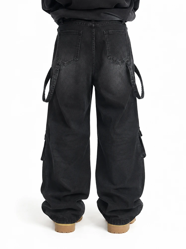 Back view of black wide leg cargo denim jeans with utility pockets