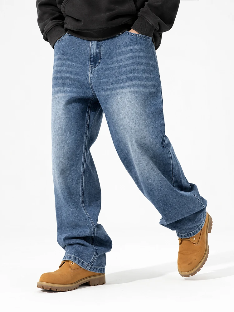 Model wearing light wash wide leg denim jeans