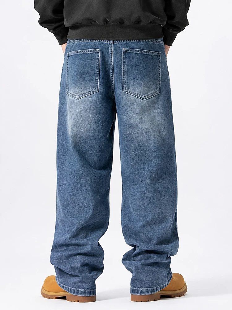 Back view of blue loose fit custom denim jeans
