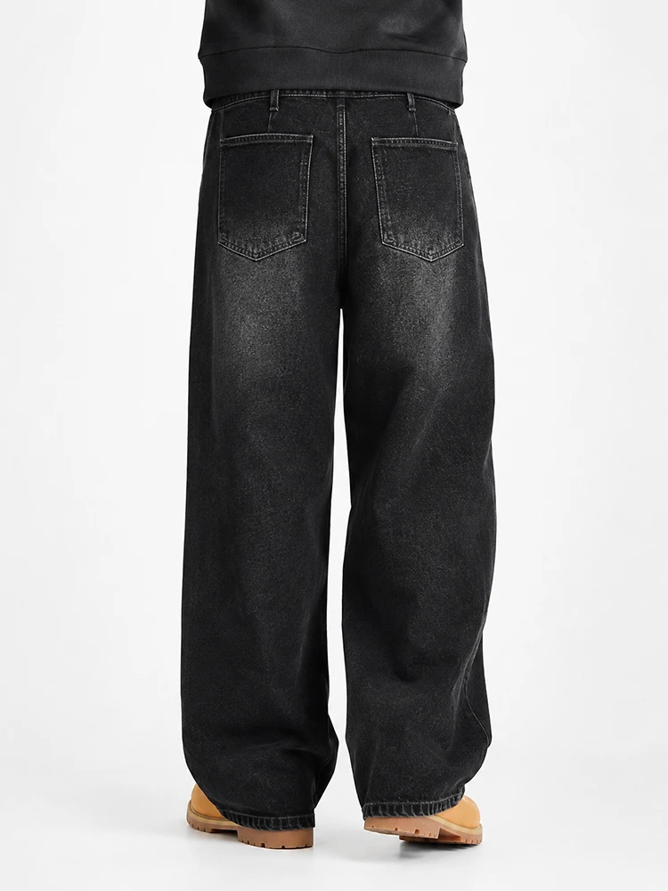 Back view of black washed wide leg denim jeans