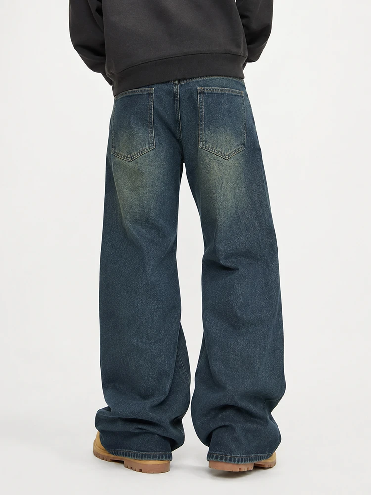 Back view of vintage wash wide leg denim jeans