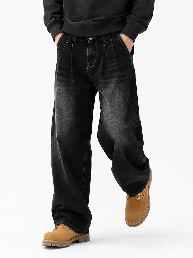 Front view of black washed baggy denim jeans