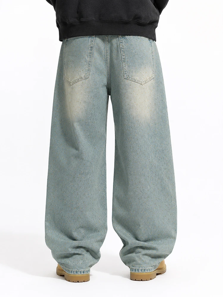 Front view of light wash loose fit denim jeans